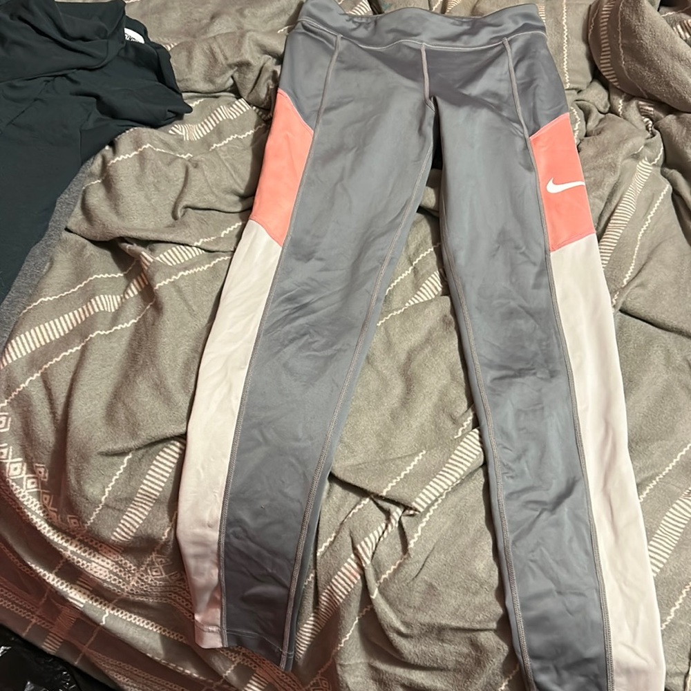 Nike girls pink, white, and grey running leggings